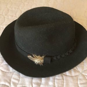 100% wool black hat with a braid and feather